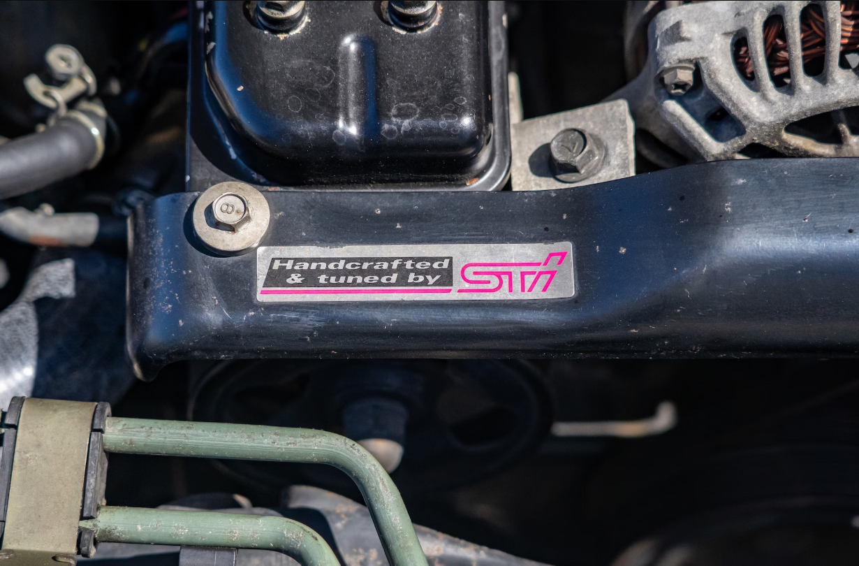 Handcrafted & Tuned By STI Sticker
